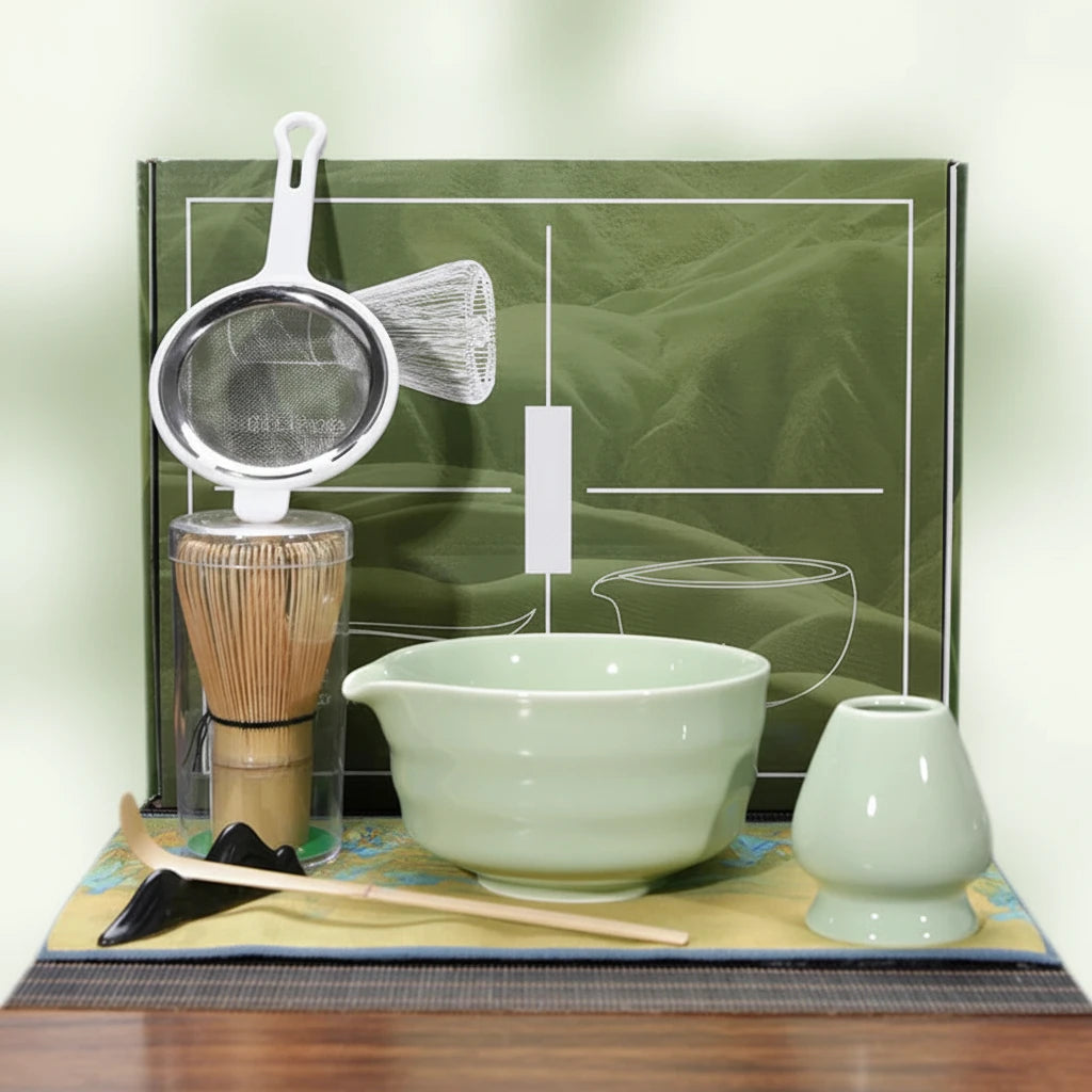 Set of matcha preparation tools with a green box in the background